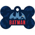 Front view of DC Comics Batman bone dog ID tag showing blue bat emblem, red BATMAN text, and bat silhouettes on dark blue background