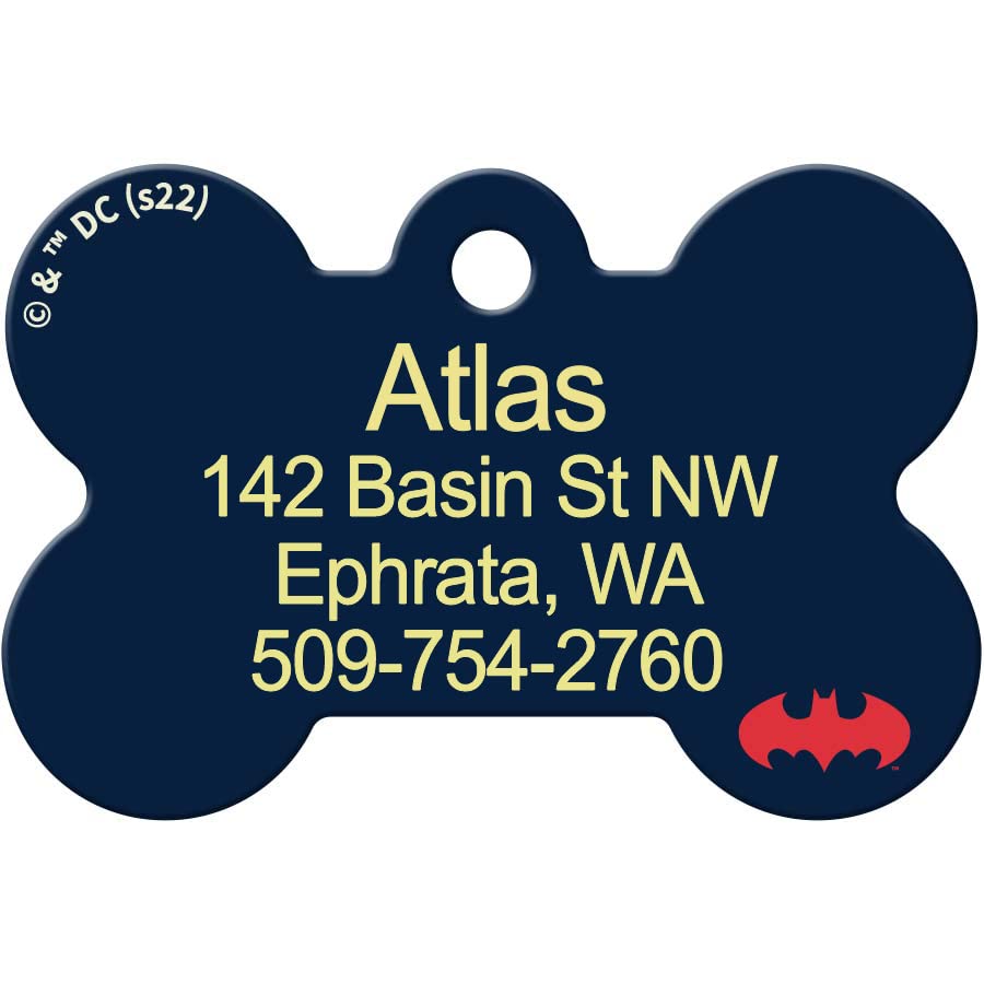 Front view of DC Comics bone-shaped dog ID tag showcasing example laser-engraving and red Batman logo on navy background