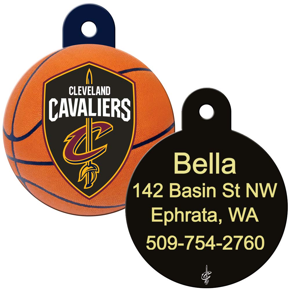 Front and back of NBA team round dog ID tag showing Cleveland Cavaliers logo and engraved back reading Bella and phone number, 1.25 x 1 in