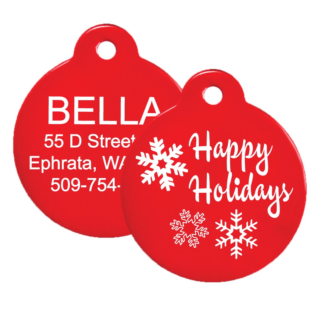 Front and back view of red Christmas dog ID tag showcasing Happy Holidays design, sample engraved back, and glow in the dark silencer on white background