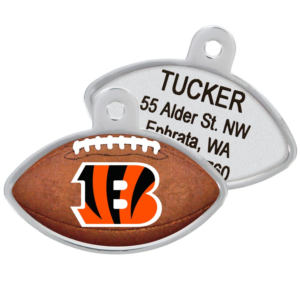Front and back of football-shaped NFL dog ID tag showing Bengals logo and laser-engraved back with sample name on white background