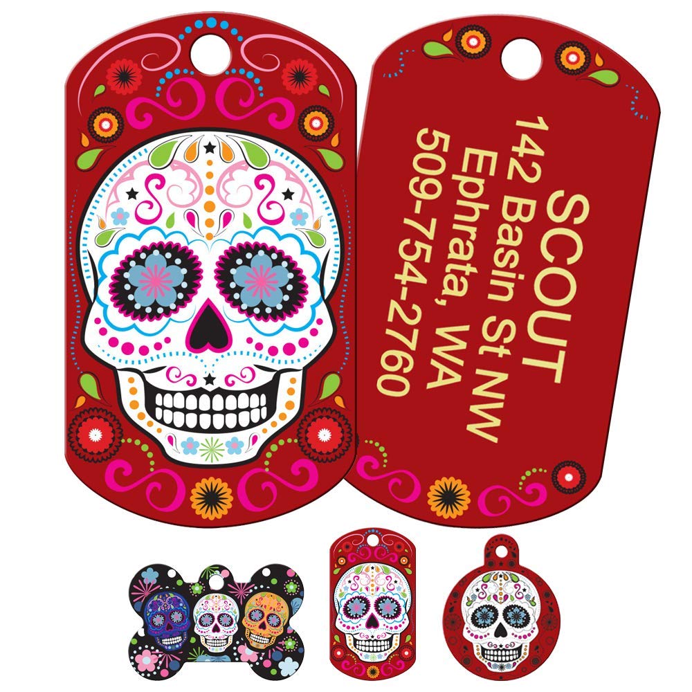 Front and back of Day of the Dead dog ID tag showing sugar-skull design and sample engraved contact info on white background