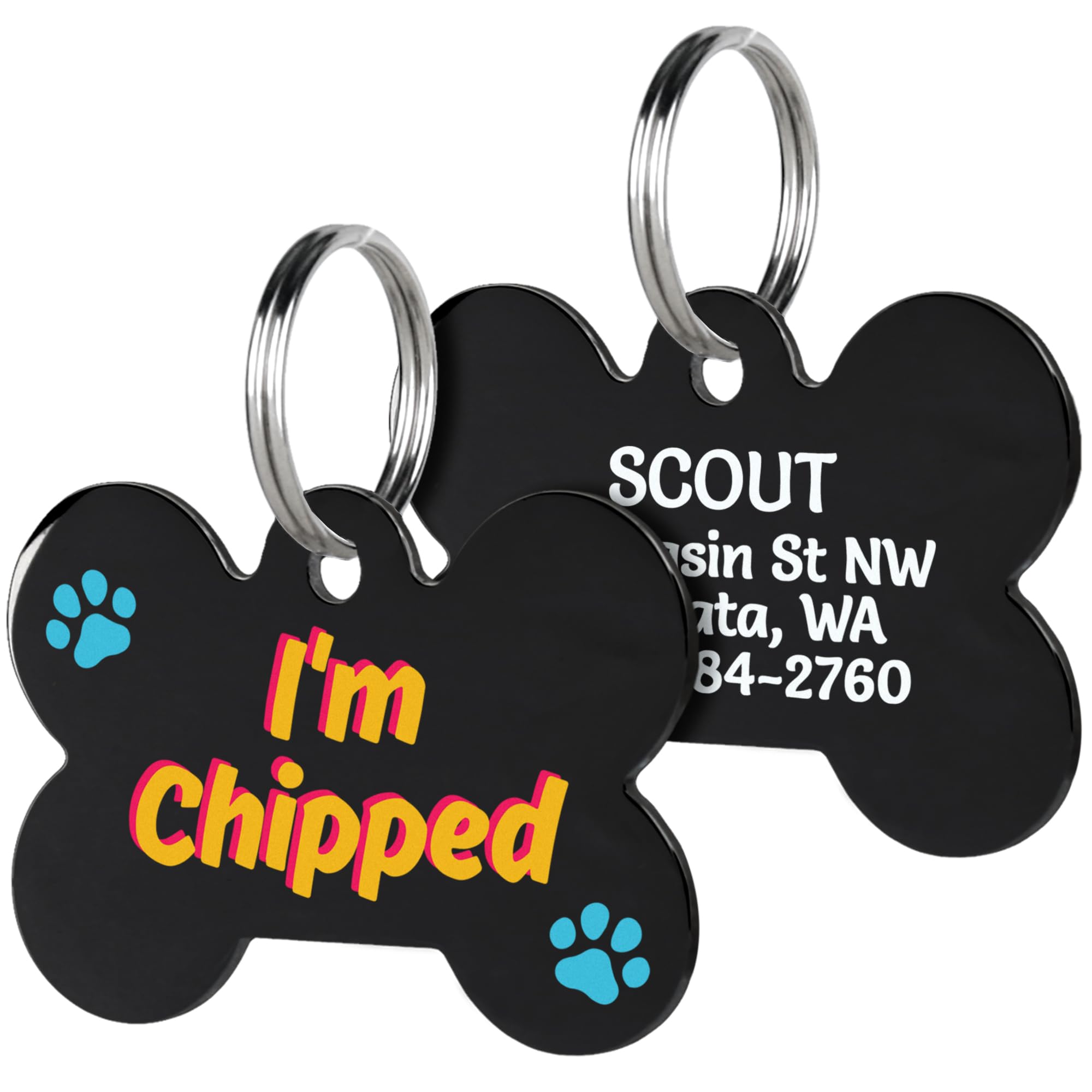 Front and back view of black acrylic bone dog ID tag showing front text I’m chipped and personalized back on white background