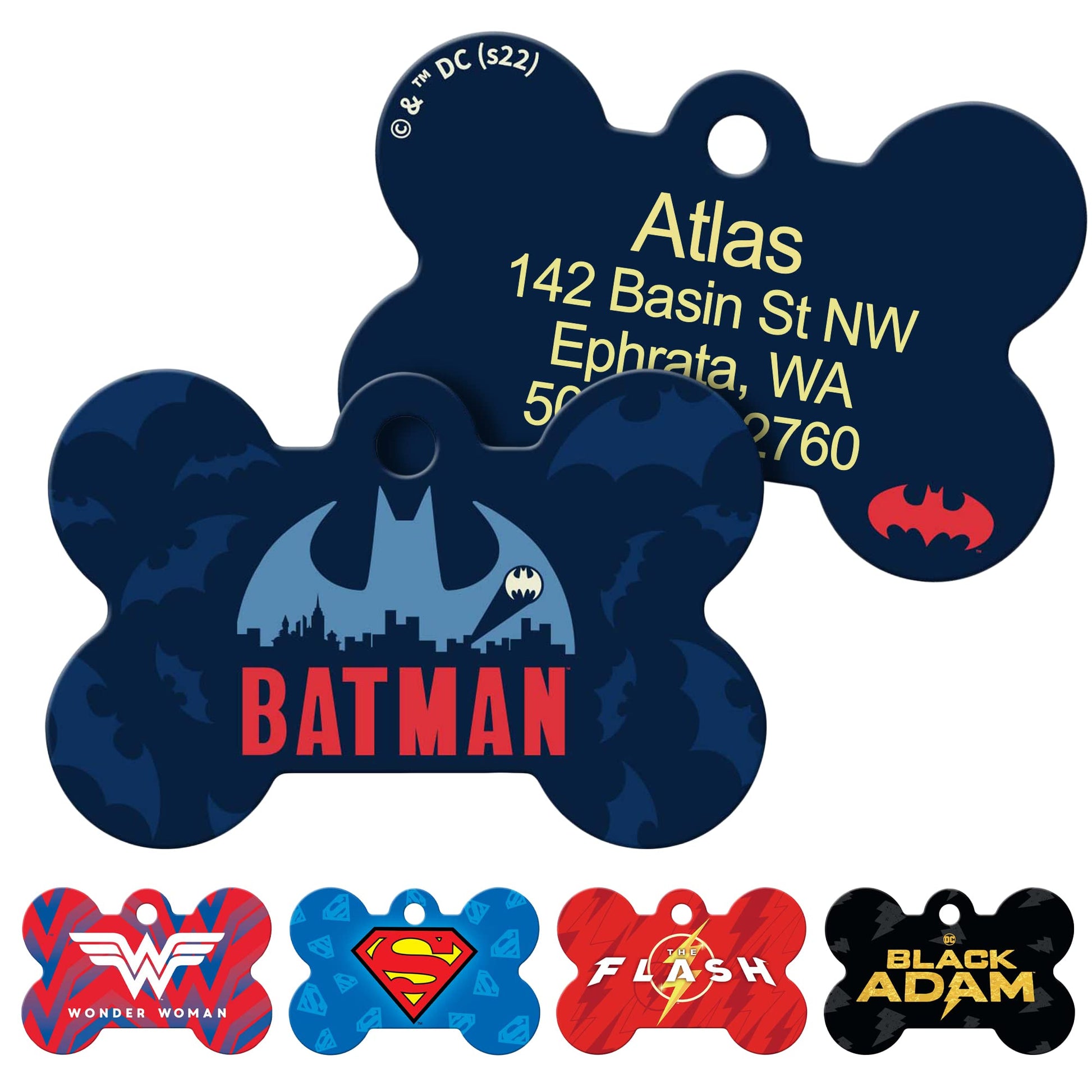 Angled front and back of DC Comics bone tag showing Batman logo, navy finish and sample engraved back text