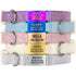 Front view of cotton and hemp dog collars with engraved slide-on ID plates and sample phone numbers on pastel straps