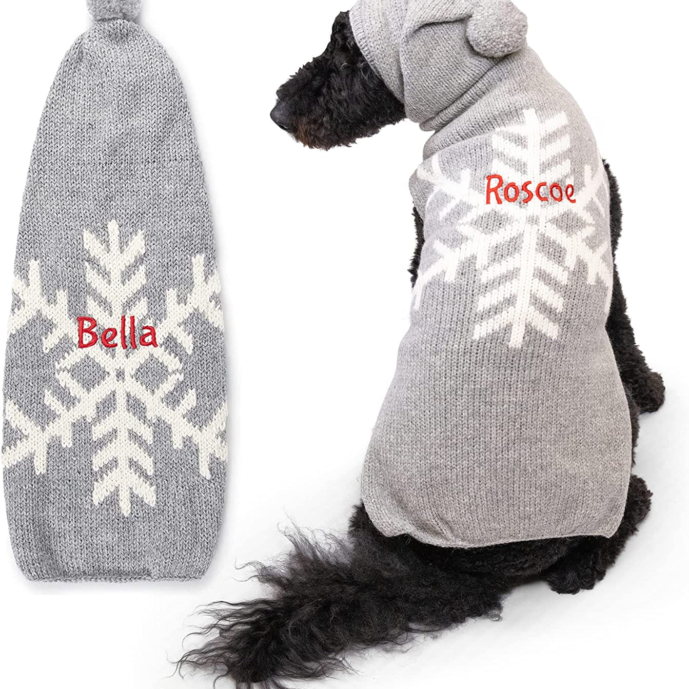 Back view of Snowflake dog sweater showing white snowflake, hood pompom, and red name ‘Roscoe’ on white background