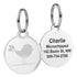 Close-up of embossed pet ID tags showing split-ring attachments, bird and paw designs, and sample engraving ‘Charlie’ on white background