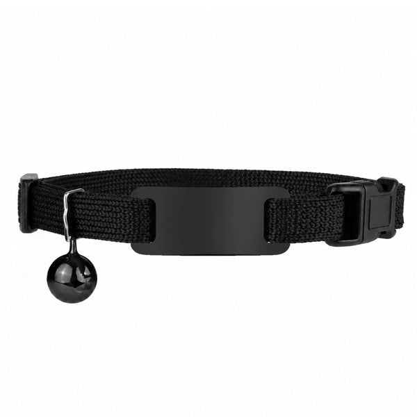Flat lay of black reflective cat collar with engraved ID plate, bell and breakaway buckle on white background