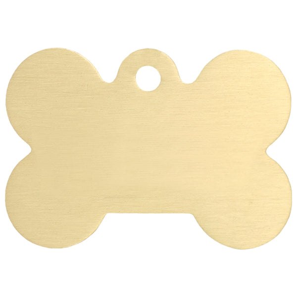Front view of brass bone-shaped pet ID tag showing blank engraving surface on a white background