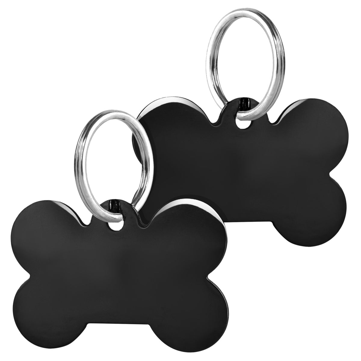 Close-up of black stainless steel bone pet ID tag with blank surface and two split rings on white background