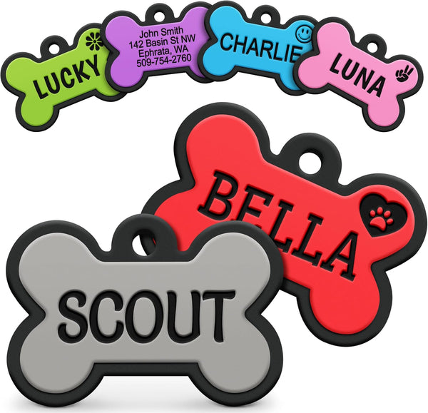 Front view of gray bone-shaped silicone dog ID tag showcasing personalized engraving with colorful tags in the background