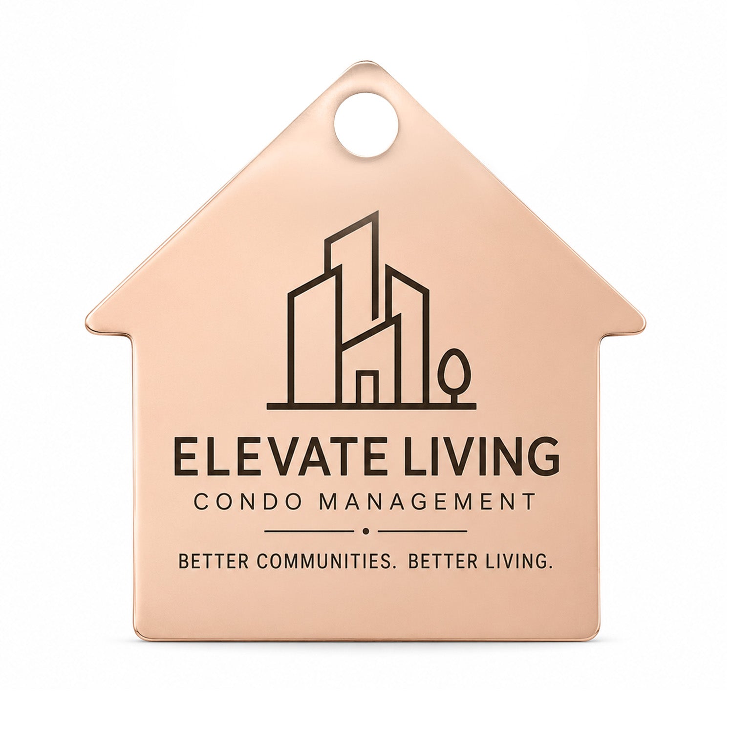 Front view of a house-shaped pet tag with Elevate Living Condo Management engraving on a white background