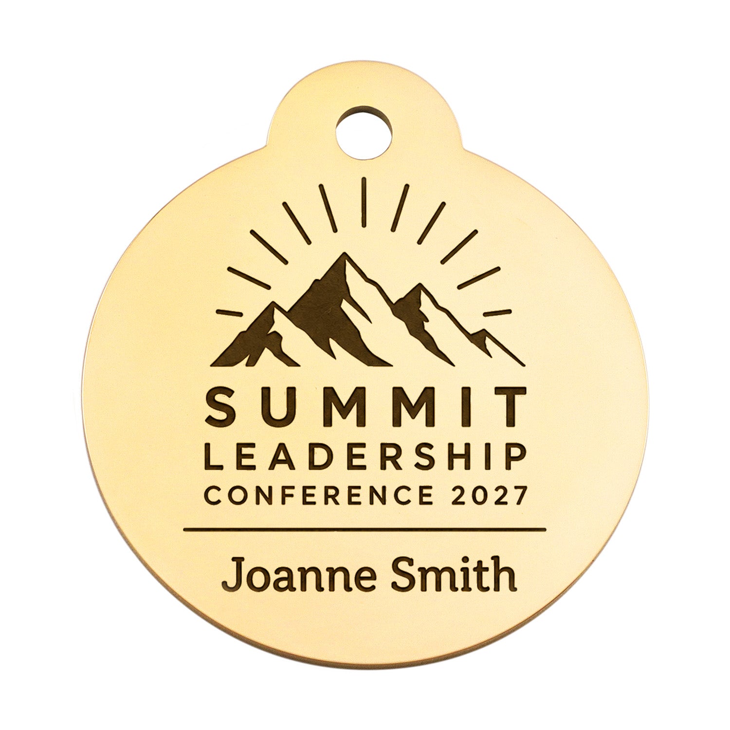Front view of a gold event pet tag with mountain artwork and text reading Summit Leadership Conference 2027 Joanne Smith