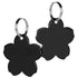 Close-up front and back view of black flower-shaped pet ID tags with polished stainless steel finish and split rings