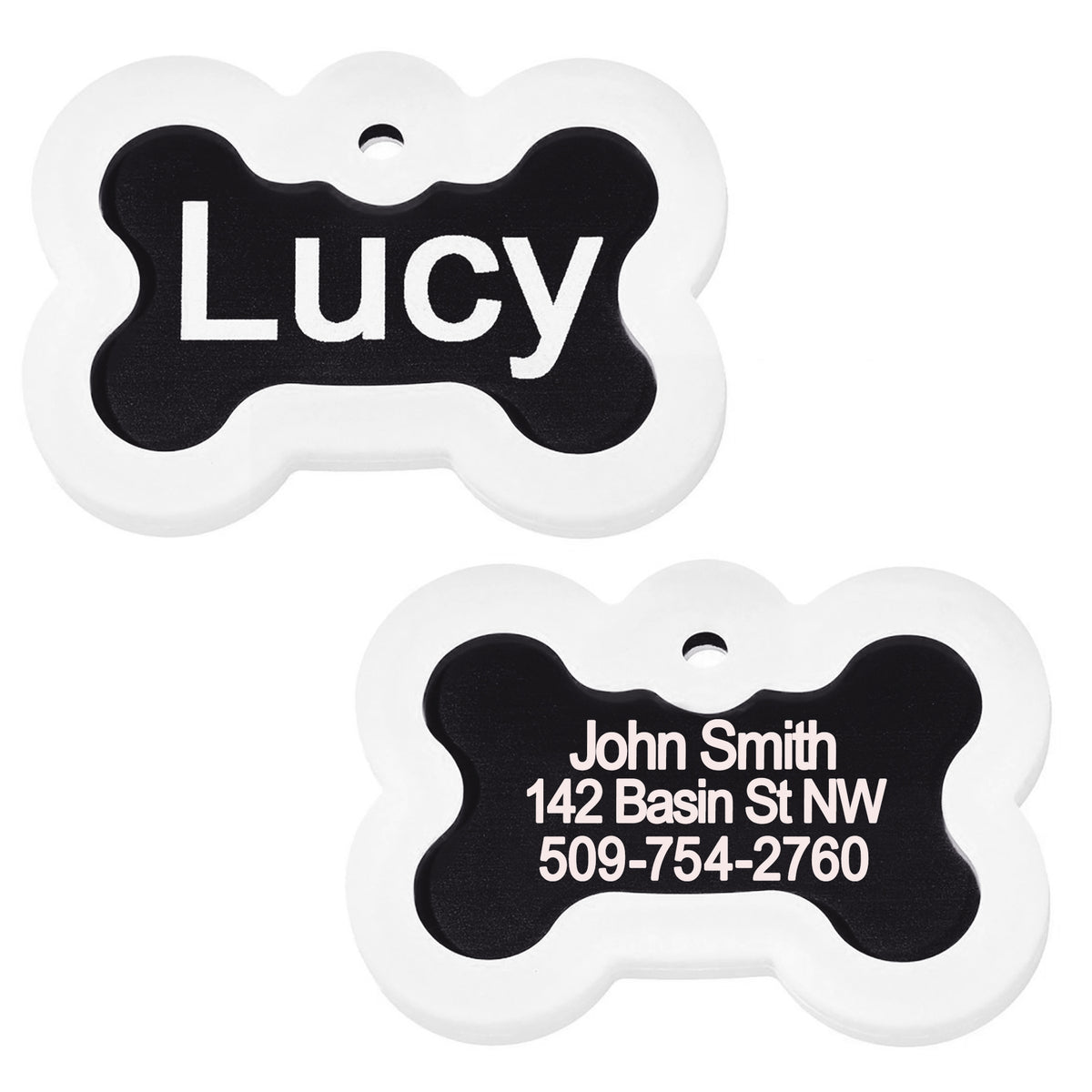 Front and back of black anodized bone pet ID tag showing glow-in-the-dark silencer and sample engraving 'Lucy' on white background