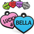 Front view of blue heart-shaped silicone pet ID tag showcasing personalized BELLA engraving with colorful tags on a white background