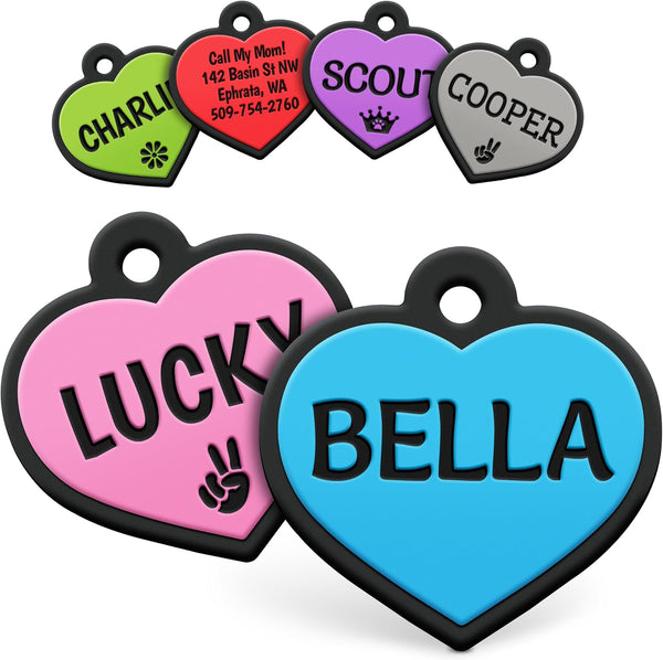 Front view of blue heart-shaped silicone pet ID tag showcasing personalized BELLA engraving with colorful tags on a white background