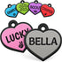 Front view of Heart Silent Silicone Pet ID Tag showcasing a gray heart with BELLA engraving and colorful examples