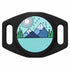 Close-up front of AirTag silicone holder showing mountain-and-forest design on black silicone with slide-on collar slots