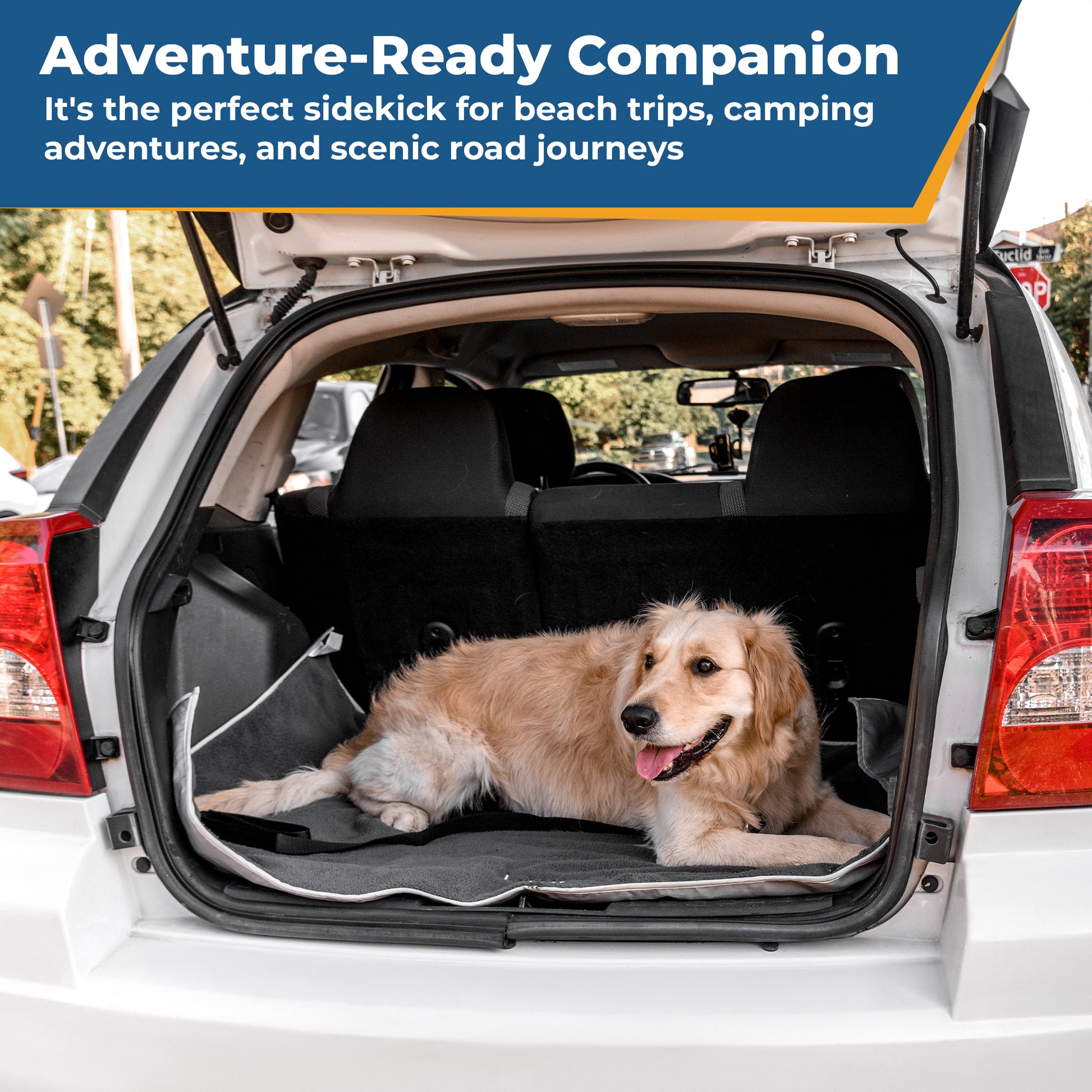 Dog lying on embroidered gray fleece blanket with water-resistant backing in an open car trunk, banner reads Adventure-Ready Companion