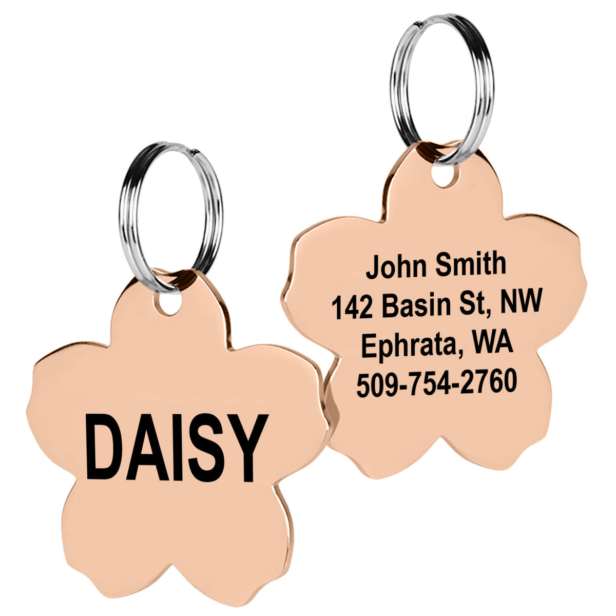 Front and back view of rose gold flower pet ID tag showing engraved DAISY and sample address and phone on white