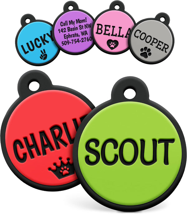 Front view of Round Silent Silicone Pet ID Tags showcasing colorful engraved names and paw prints on a white background