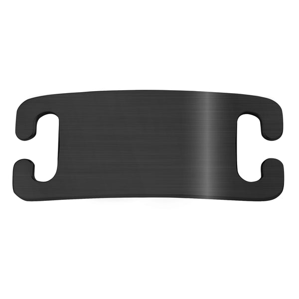 Close-up of black slide-on dog ID tag showcasing dual belt-buckle slide slots and brushed aluminum finish on white background