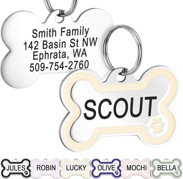 Front view of Bone Dog ID Tag with Enamel Paw showcasing cream enamel paw print and Scout engraving with sample tags below