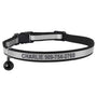 Front view of a black reflective cat collar showcasing engraved name and phone number, breakaway buckle, and bell on white background