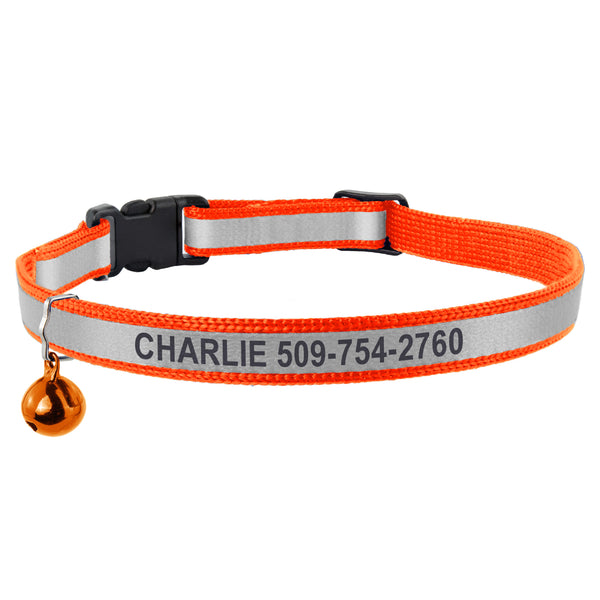 Front view of orange reflective cat collar showcasing engraved Charlie and phone number 509 754 2760, breakaway buckle, and bell