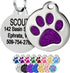 Close-up of a purple glitter paw print pet ID tag showing polished stainless steel and a personalized back