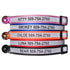 Close-up of stacked personalized engraved reflective cat collars showing engraved names and phone numbers, reflective strip, breakaway buckles and attached bells