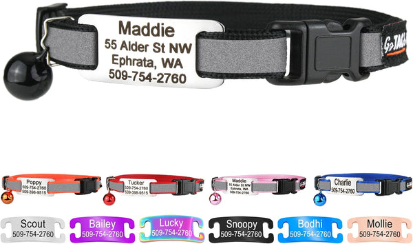 Close up of a black personalized reflective cat collar showcasing an engraved metal tag safety buckle and bell on white background