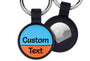 Front view AirTag keychain with blue and orange silicone, two-line engraving and metal split ring on white background