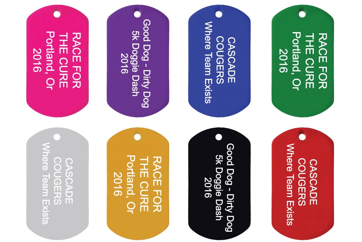 Front view of Engraved Military Dog Tags showcasing eight color options with vertical white engraving on a white background