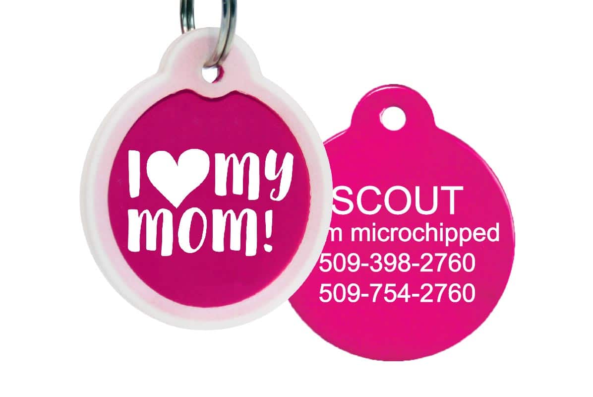 Front and back view of pink round I love my mom pet ID tag with white silencer and sample engraved contact info