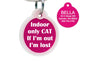 Front view of pink round cat ID tag with white silencer and text ‘Indoor only CAT If I’m out I’m lost’